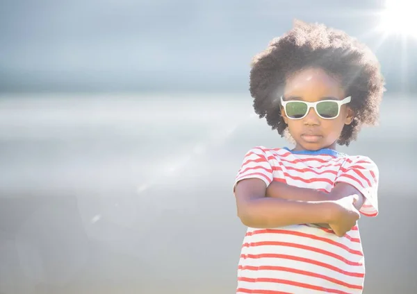 Boy in sunglasses arms folded — Stock Photo, Image