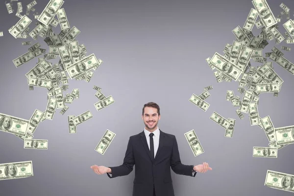 Hombre de negocios feliz con lluvia de dinero sobre fondo púrpura —  Fotos de Stock