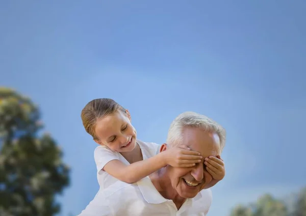 Girl and grandfather piggyback — Stock Photo, Image