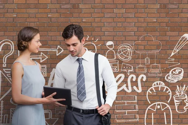 Business people looking at a tablet — Stock Photo, Image