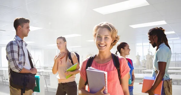 Students in front of classroom background — Stock Photo, Image
