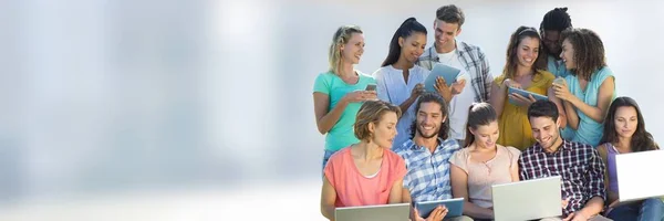 Group class of Students in front of blurred background — Stock Photo, Image