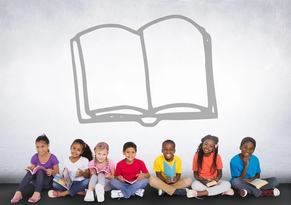 Children sitting in front of book graphic — Stock Photo, Image