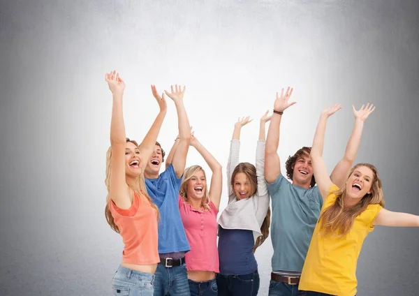 Groep studenten staan voor lege grijze achtergrond — Stockfoto