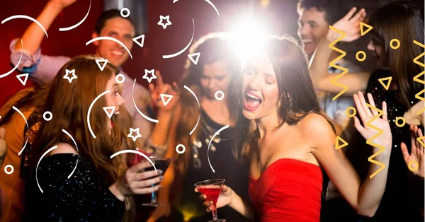 People celebrating in night club — Stock Photo, Image