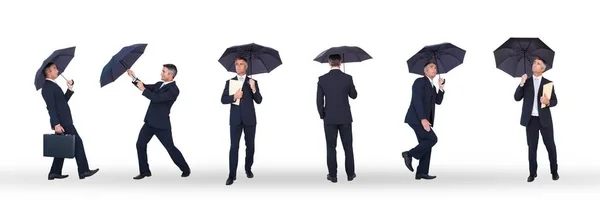 Affärsman med paraply collage — Stockfoto