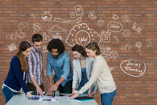 Business people pointing tablet — Stock Photo, Image