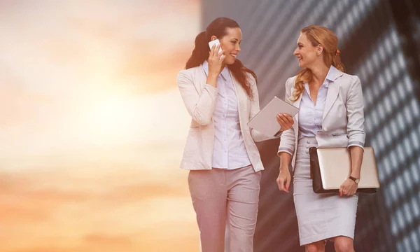 Businesswomen using mobile phone — Stock Photo, Image