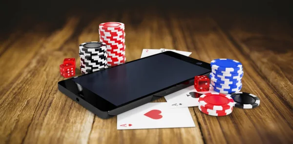 Teléfono móvil con fichas de casino —  Fotos de Stock