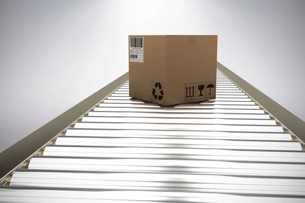 Box on conveyor belt — Stock Photo, Image