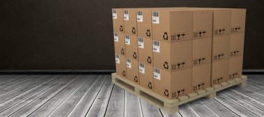 karton kutular üzerinde ahşap palet düzenlenmiş