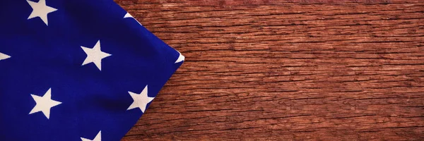 American flag on wooden table — Stock Photo, Image