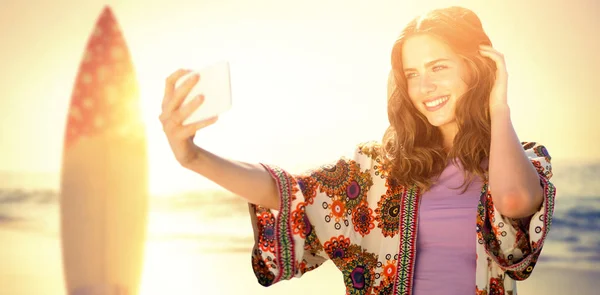 Smiling girl taking selfie — Stock Photo, Image