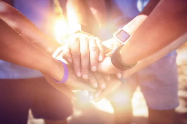 Marathon athletes forming hands stack — Stock Photo, Image