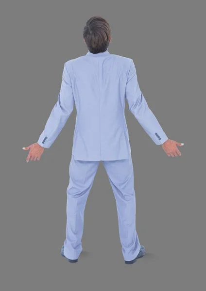 회색 배경으로 서 있는 남자 — 스톡 사진