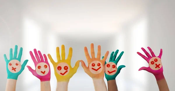 Colorful hands with faces — Stock Photo, Image