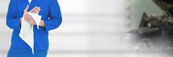 Mechanic man cleaning his hands — Stock Photo, Image