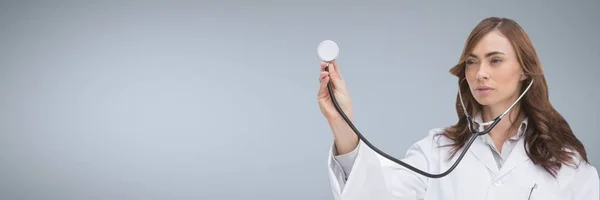 Doctor woman holding stethoscope — Stock Photo, Image