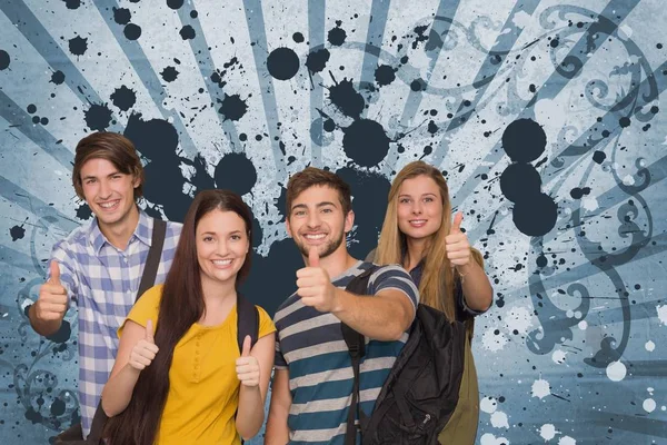 Students against blue splattered background — Stock Photo, Image