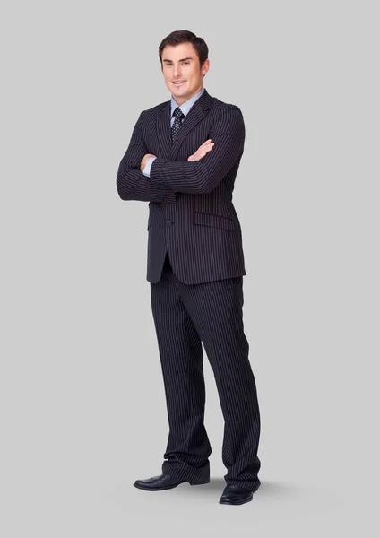 Man standing with grey background Stock Picture