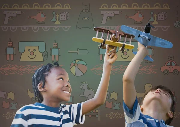 Bambini che giocano con aerei giocattolo — Foto Stock