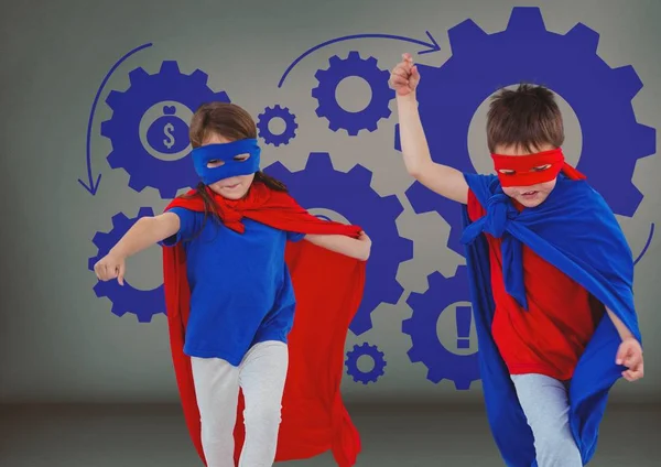 Дети-супергерои с иконками настроек — стоковое фото