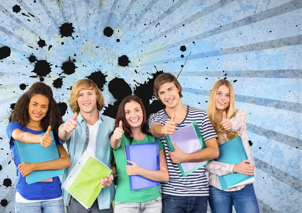 Happy young students holding folders against blue splattered background — Stock Photo, Image