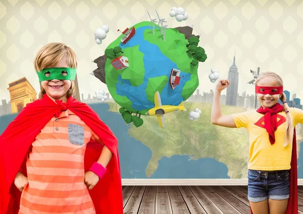 Дети-супергерои в комнате с планетой Земля — стоковое фото