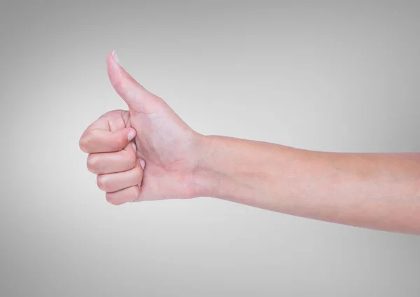 Руки сдают большой палец — стоковое фото