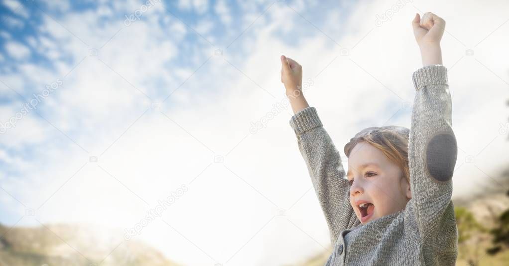 Girl celebrating under the sky