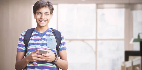 Portrait of happy boy using phone — Stock Photo, Image