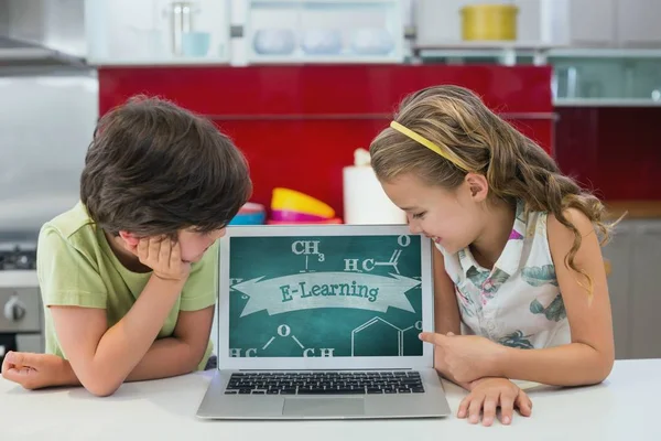 Kids looking at a computer — Stock Photo, Image