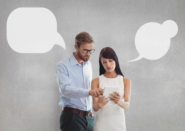 Business people looking at a tablet