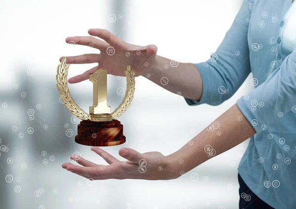 Woman with a trophy on hands — Stock Photo, Image