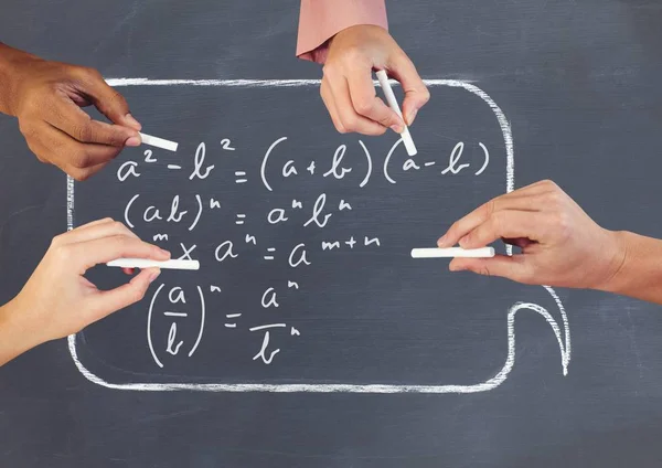 Hands writing equations on blackboard — Stock Photo, Image