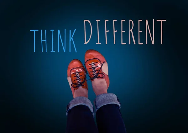 Think Different text and red shoes on feet