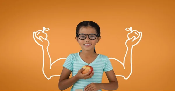 Estudante menina com punhos gráfico segurando uma maçã — Fotografia de Stock