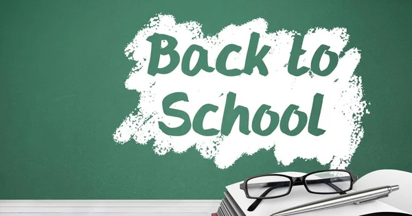 Back to school text on blackboard — Stock Photo, Image