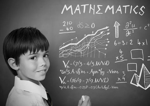 Equations on blackboard with boy — Stock Photo, Image