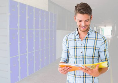 erkek öğrenci holding kitap 