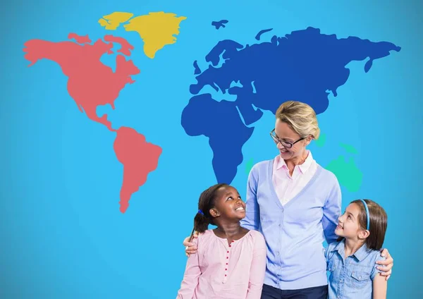 Kids with teacher in front of colorful world map — Stock Photo, Image