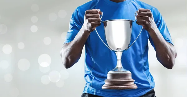 Man with a trophy on hands — Stock Photo, Image