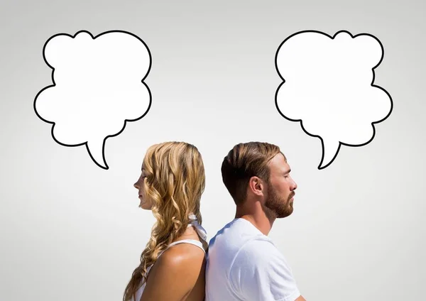 Couple with speech bubbles — Stock Photo, Image