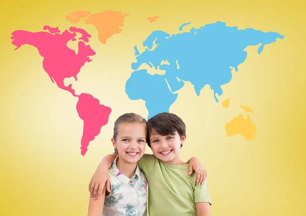 Boy and girl hugging in front of world map — Stock Photo, Image