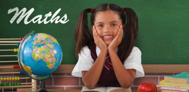 eğilerek Küre ve kitaplar tarafından kız öğrenci