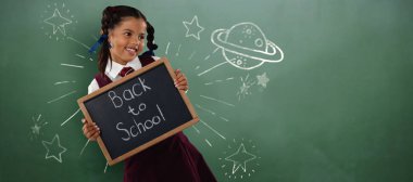 kız öğrenci holding yazma kayrak 