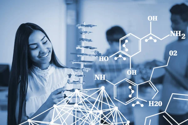 Estructura química contra colegiala sonriente —  Fotos de Stock