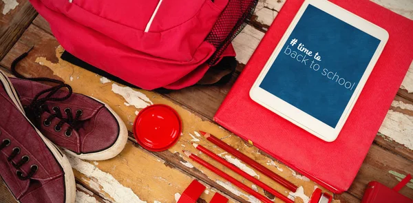 Saco com tablet e sapatos na mesa — Fotografia de Stock