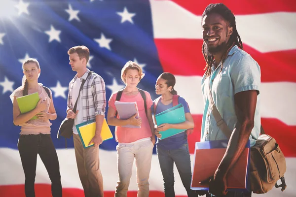 Composite image of happy students outside on campus — Stock Photo, Image