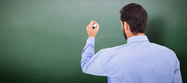 Empresario en traje escribiendo con marcador — Foto de Stock